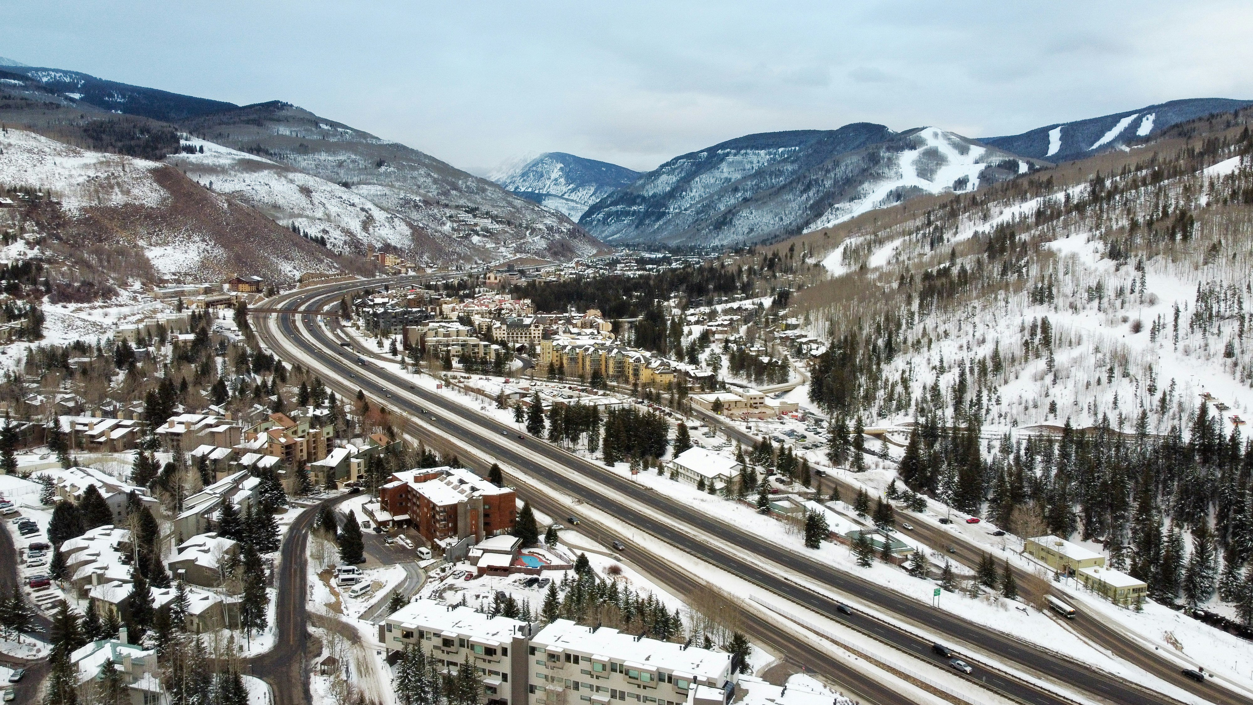 Aerial view of Vail town nestled in a snowy mountain valley