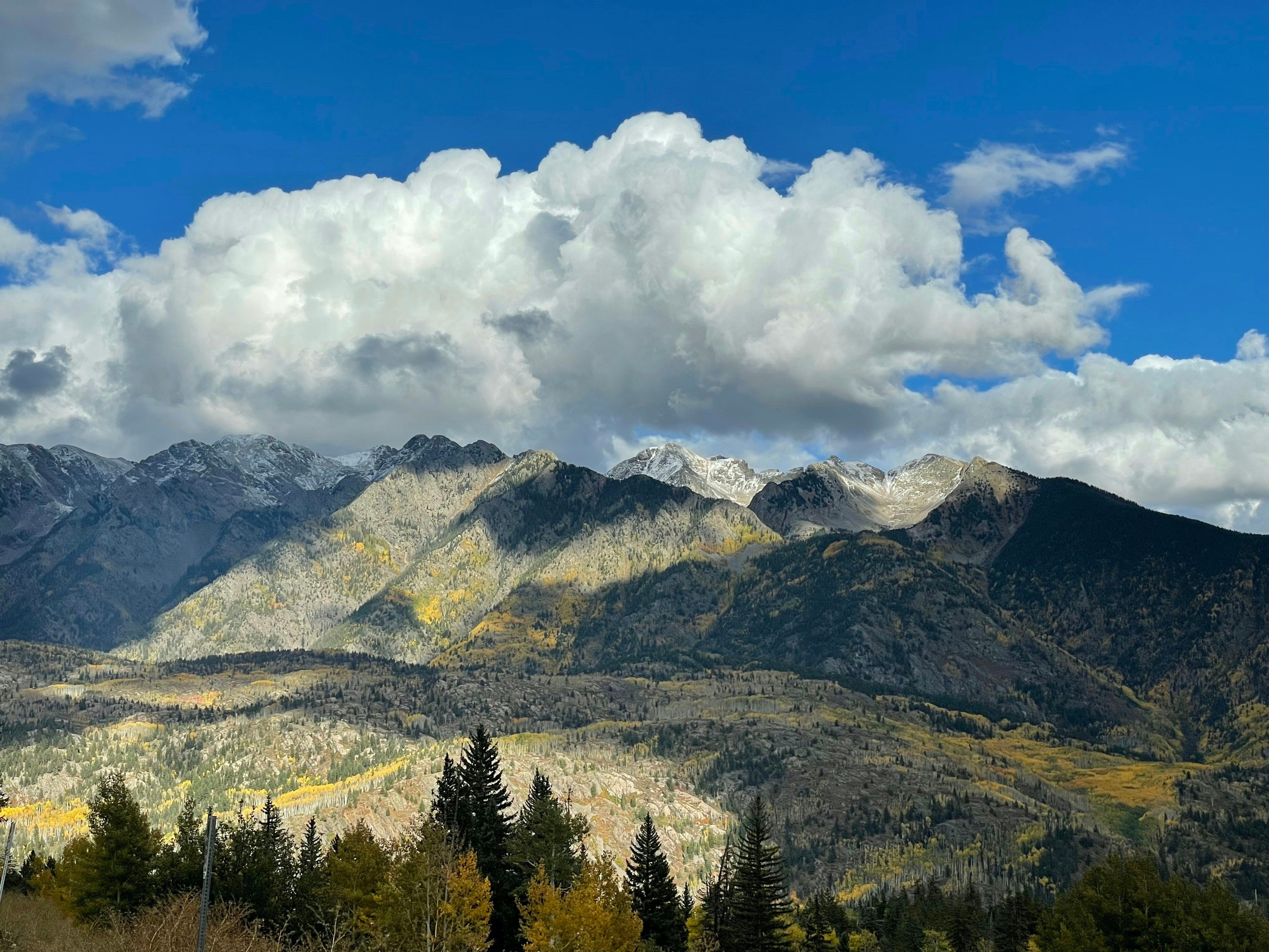 San Juan peaks with dramatic clouds in fall